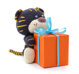 Canvas Print - Toy tiger and gift.