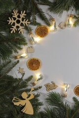 A part of christmas decoration on the white background with lights