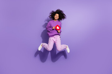 Sticker - Full body portrait of crazy afro hairstyle girl hold user click comment card have fun isolated on violet color background