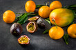 Tropical and subtropical fruits rich in vitamins: Mango, tangerines and passion fruit