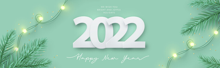 Wall Mural - happy new year 2022 design. light green background with paper cuted 2022, realistic pine branches an