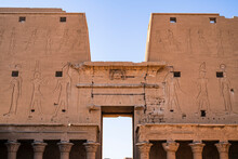 Detail Of The Main Facade Of The Temple Of Edfu In Its Inner Courtyard. Photograph Taken In Edfu, Aswan, Egypt. 