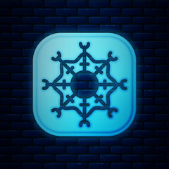 Sticker - Glowing neon Snowflake icon isolated on brick wall background. Merry Christmas and Happy New Year. Vector