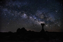 Milky Way And Toad Stool Hoodoo In The Utah Desert.