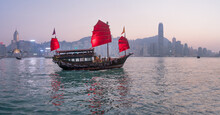 Traditional Junk Boat At The Victoria Harbour In Hongkong, China