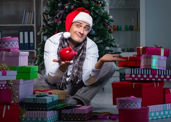 Canvas Print - Man with many christmas gifts in boxes