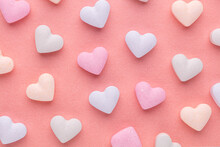 Composition With Candy Hearts On Pastel Blue Background.
