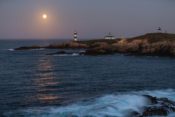 Wall Mural - November Full Moon over the Illa Pancha lighthouse and hotel, in Ribadeo, Galicia, Spain!