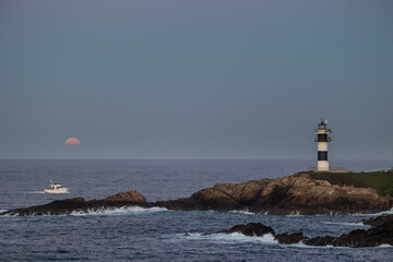 Wall Mural - November Full Moon over the Illa Pancha lighthouse and hotel, in Ribadeo, Galicia, Spain!