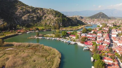 Wall Mural - Aerial drone fly in Dalyan. River, town, summer day