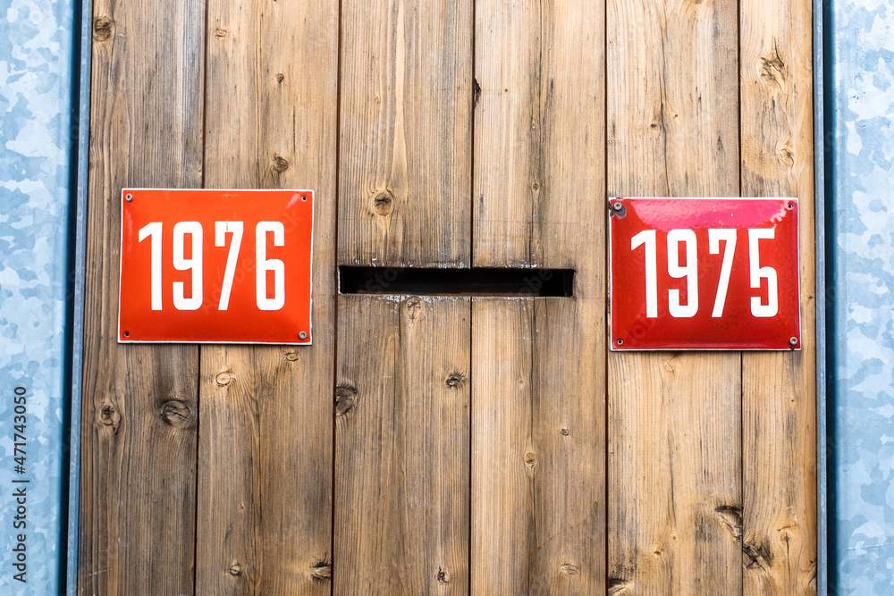 House numbers associated with years of birth 1976 and 1975 Stock Photo ...