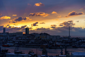 Canvas Print - Dramatic sunrise over the Diomid port. Vladivostok