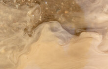 Muddy Brown Water In A Puddle