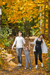 © alenazamotaeva - Autumn walk of a young family in the forest 3373.