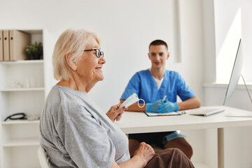 Sticker - elderly patient talking to the doctor health care