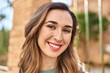 © Krakenimages.com - Young woman smiling confident standing at street