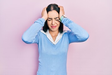 Sticker - Beautiful woman with blue eyes standing over pink background suffering from headache desperate and stressed because pain and migraine. hands on head.