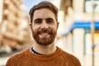 © Krakenimages.com - Young caucasian man with beard outdoors on a sunny day