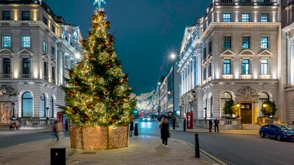 Wall Mural - Evening time lapse view of the beautiful christmas decorated city center with Waterloo Place and lower Regent Street, London