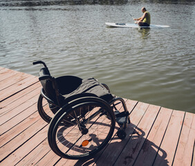 Person with a physical disability ride on sup board