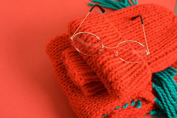 Poster - stylish eye glasses on a red knitted hat, christmas sale in the optics store