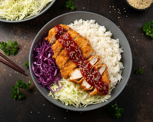 Wall Mural - Crispy Katsu chicken with sauce, rice and cabbage.