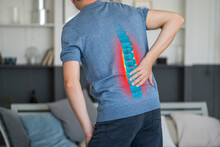 Lumbar Intervertebral Spine Hernia, Man With Back Pain At Home, Spinal Disc Disease