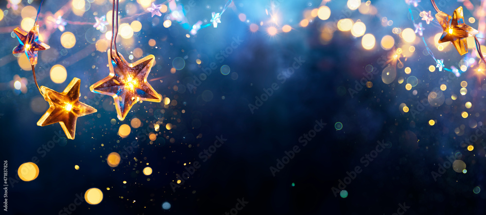Christmas Stars Lights - Golden String Hanging In Blue Background With ...