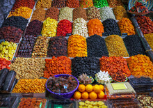Delicious Dried Fruits, Sweets  And Nuts On Counter At Wholesale Market