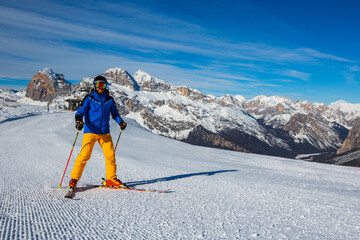 Wall Mural - Alpine skier on slope at Cortina