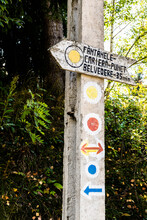 Signpost With Various Hiking Trail Directions. Route Marking For Tourists.