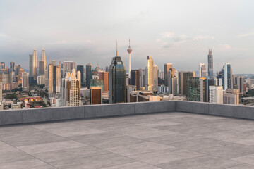 Wall Mural - Panoramic Kuala Lumpur skyline view, concrete observatory deck on rooftop, sunset. Asian corporate and residential lifestyle. Financial city downtown, real estate. Product display mockup empty roof