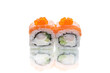 Two pieces of Japanese sushi roll with salmon slice and caviar on top, shrimp, cucumber, cream cheese inside roll. Side view of inside out roll isolated on white background. Copy space menu image
