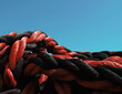 © Image Source RF - Close up of coiled mooring rope