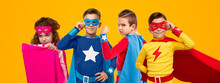 Confident Strong Superhero Children In Studio