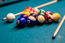 Billiard Balls In A Green Pool Table, Ready For Recreational Activity