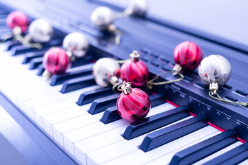 Wall Mural - Piano keys with Christmas decorations, closeup