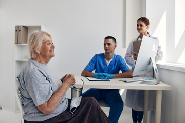 Wall Mural - old woman communication with a doctor health care