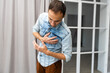 © Angelov - Young athletic man has a sudden heart attack