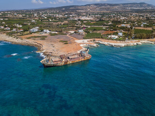 Wall Mural - Old ship wreck near coast in Paphos Cyprus - aerial view