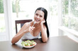 © u photostock - Portrait sexy asia woman with salad, healthy diet concept