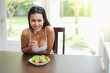 © u photostock - Portrait sexy asia woman with salad, healthy diet concept