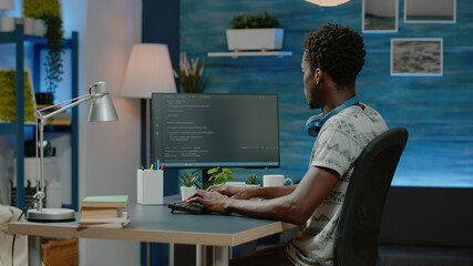 Wall Mural - programmer using binary code for website interface development on computer. person coding system for