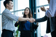 © visoot - Successful of businessmen handshaking and business people after discussing good deal of trading contract,Meeting business partners in a modern office.