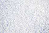 Fototapeta  - Natural snow. White abstract background. Winter. Snow surface background with copy space for design.
