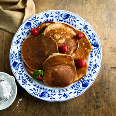 Wall Mural - Traditional homemade pancakes with raspberry