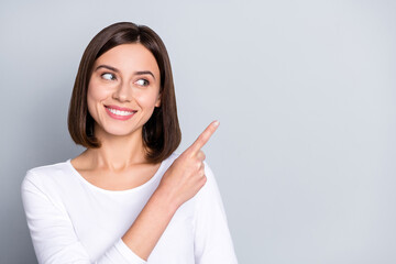Wall Mural - photo of funny bob hairdo millennial lady look index empty space wear white shirt isolated on grey c
