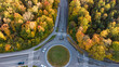 Aerial view of traffic in a roundabout next to a city in Germany