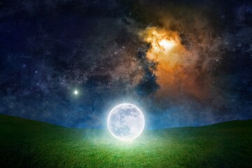 Wall Mural - Unreal fantastic image - luminous sphere, similar to full moon, levitates over green grass. Bright stars, glowing nebula in dark blue sky