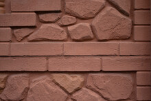 Masonry Of Red-orange Bricks Held Together With Cement Mortar Between Stones.